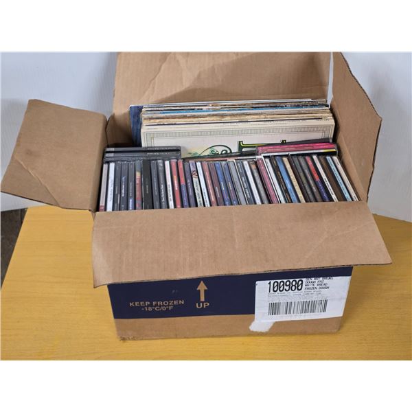 Box of vinyl records and cds