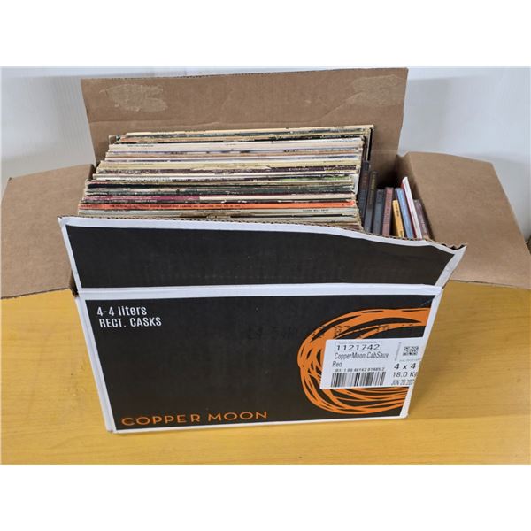 Box of vinyl records and cds