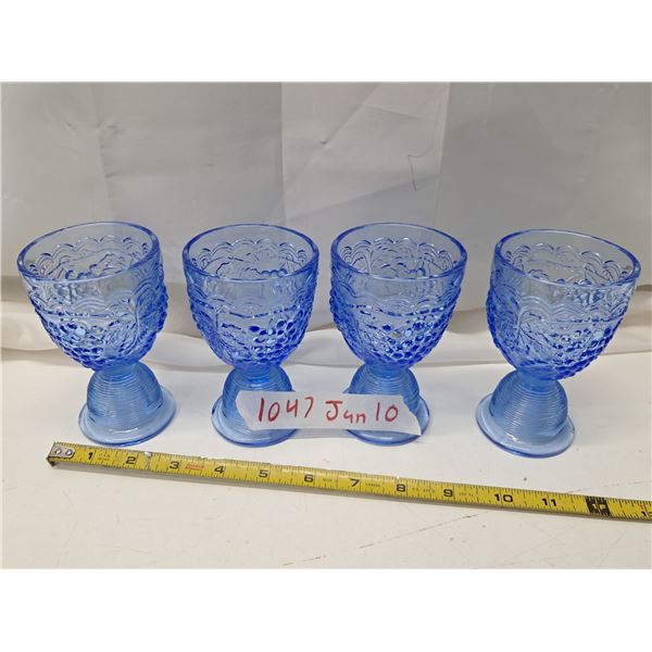 4 blue glass cups