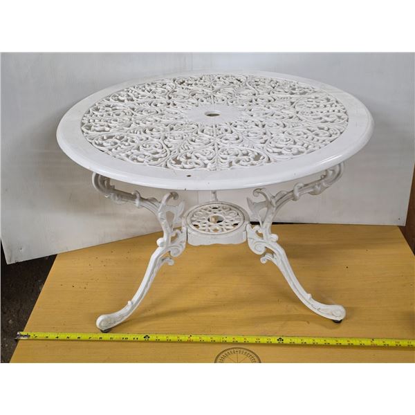 Cast iron patio table- 26" by 19"H