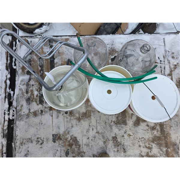 Glass jugs, buckets, hoses