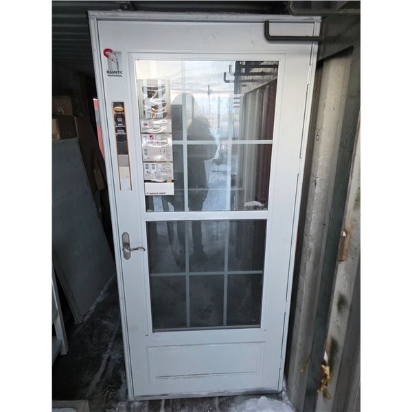 Screen door in a frame- 37" by 83"H