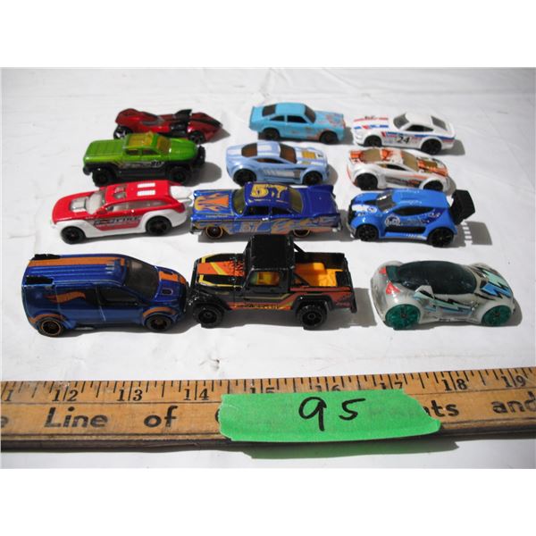 (12) hot wheels 1/64 scale