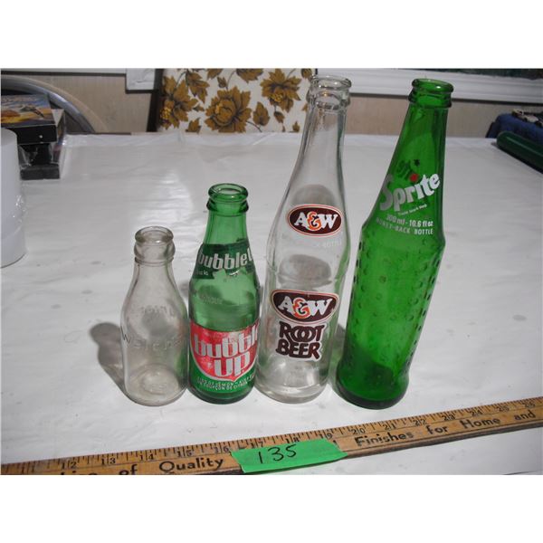 (4) vintage pop bottles