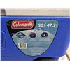 Image 2 : Coleman Cooler. Has a drain spout in bottom, two back wheels and handle for towing. Good condition