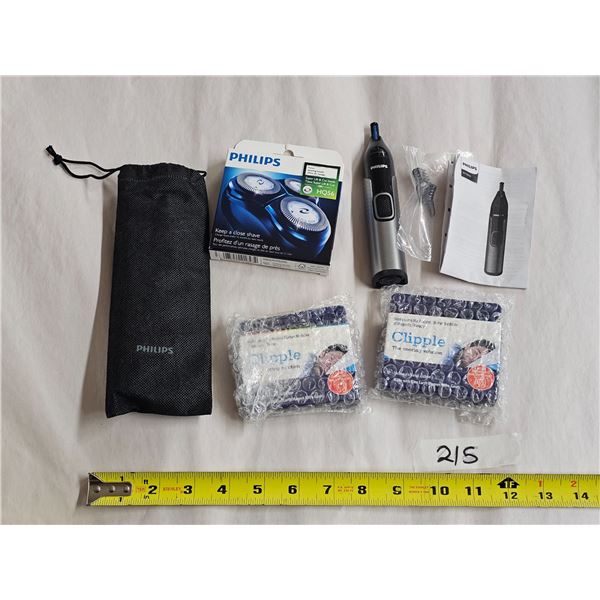 PHILIPS eyebrow, ear hair and nose hair trimmer. Comes with small and large snap-on combs and user m