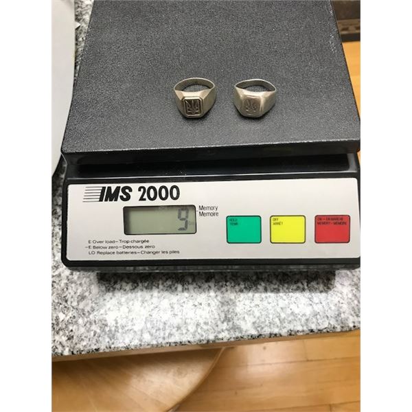 Two hallmarked sterling silver rings with Ukrainian Tryzub Coat of Arms. Combined weight: 9 grams