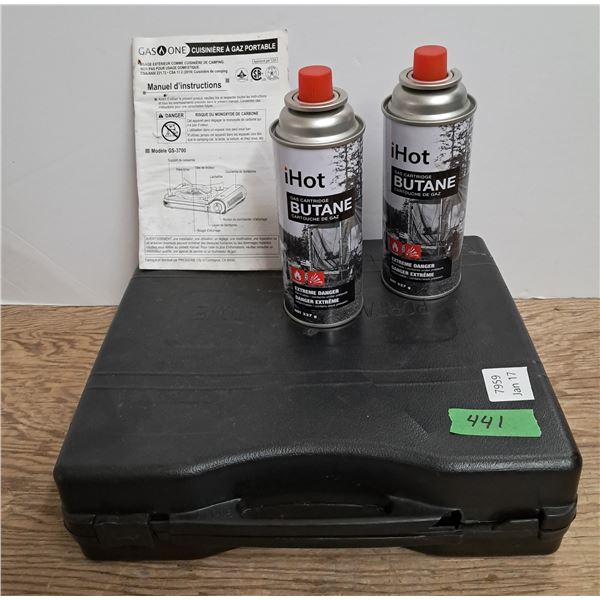 potable gas stove W/ carry case w/ (2 can of gas butane unused) (1) slide clip missing on case