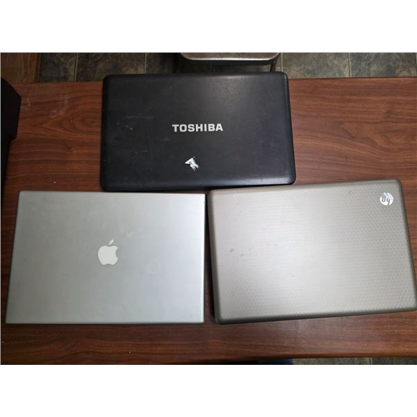 Lot of 3 Lap tops (apple, Toshiba, and HP) Apple One mIssing Bottom Battery, Others Not Known if Wor