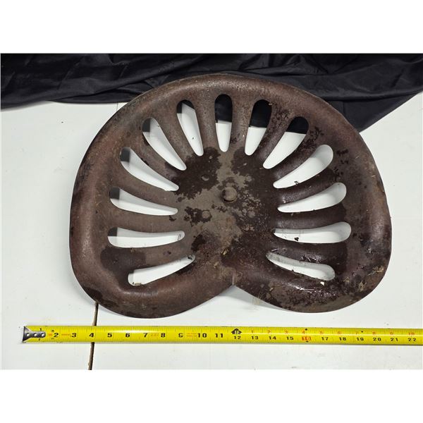 Tin tractor seat