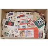 Image 1 : Canadian postmarked stamps - shoe box 1/2 full
