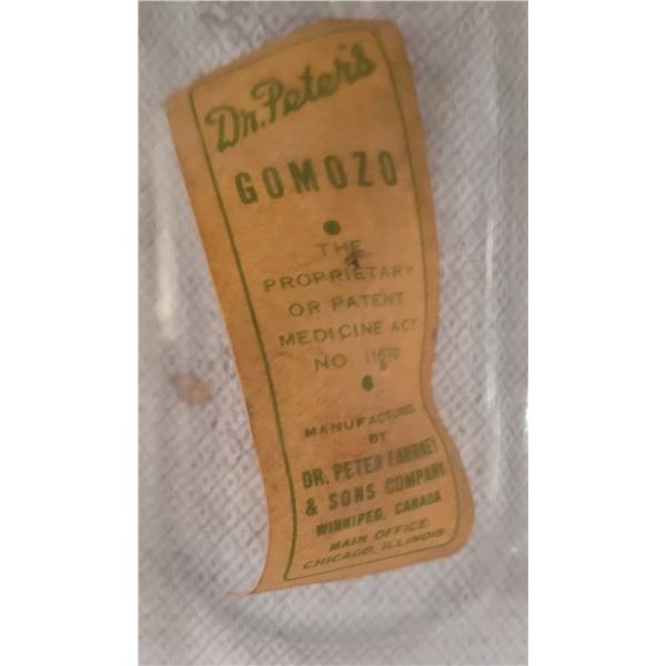 Prepared By Dr. Peter Fahrney % Sons Co. Winnipeg, Man. Canada - clear glass bottle with lid and lab