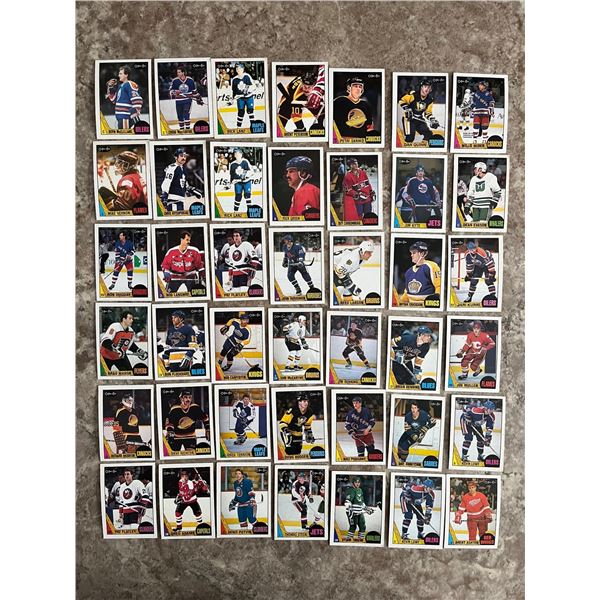 1249- 1987-88 O-Pee-Chee hockey lot of 40+ cards. Leafs. Oilers. Flames. Jets. Canucks.