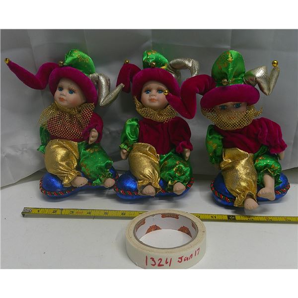 3 wind up dolls