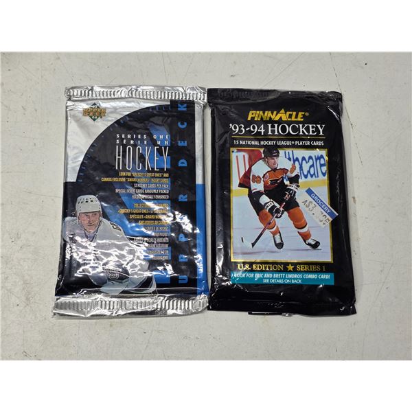 2 packs of sealed hockey cards