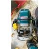 Image 2 : GROUP OF 3 CORDED MAKITA POWER TOOLS - 1 GRINDER AND 2 ROUTERS