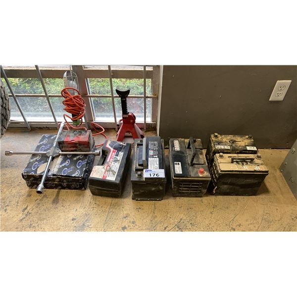 GROUP OF ASSORTED AUTOMOTIVE ITEMS - 4 BATTERIES, JACK STAND, TROUBLE LIGHT, TIRE IRON, TIRE CHAINS