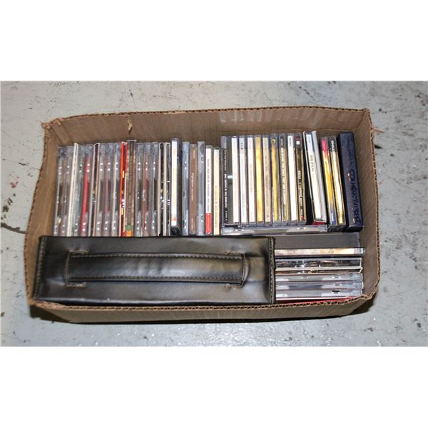 BOX OF 48 ROCK AND COUNTRY CDS