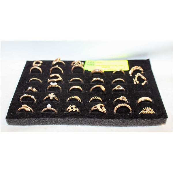 TRAY W/32 GOLDTONE RINGS