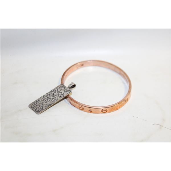 ROSE GOLDTONED SNAP OPEN BRACELET +