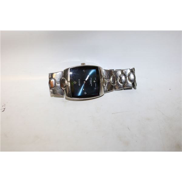 REPLICA GUCCI WATCH ("GUCCI" IS SLIGHTLY SLANTED)