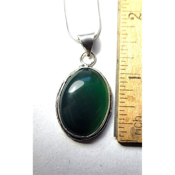 24)  BEZEL SET, OVAL NATURAL DEEP GREEN