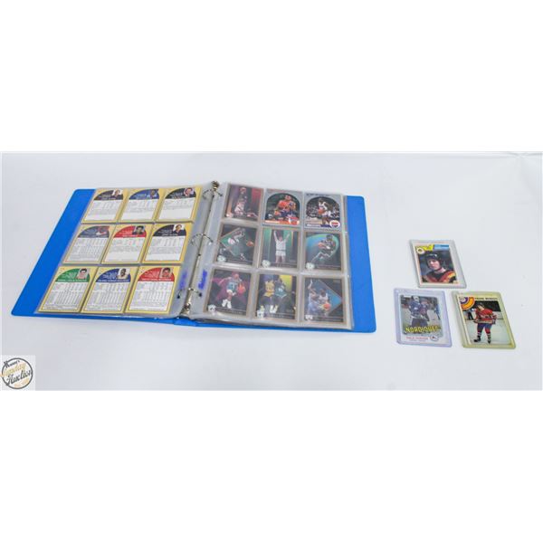 BINDER OF BASKETBALL CARDS SOLD WITH 3 HOCKEY