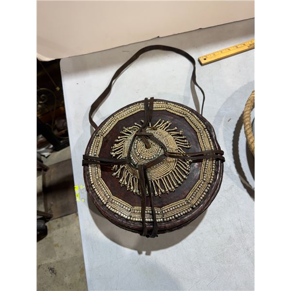 vintage Ethiopian decorative basket, handwoven from natural fibers and adorned with metal beadwork a