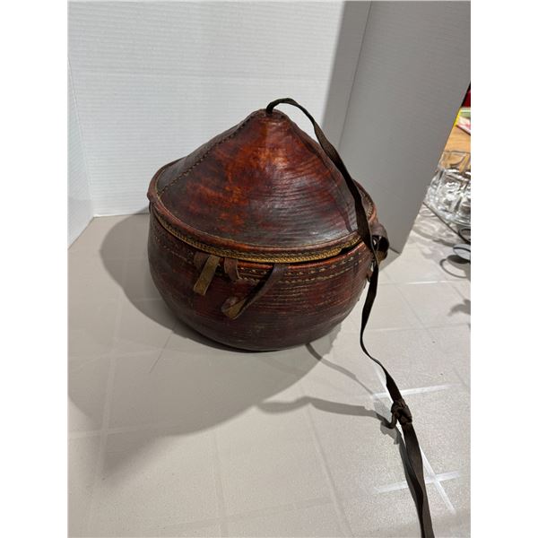 Ethiopian Agelgel leather and woven food basket.