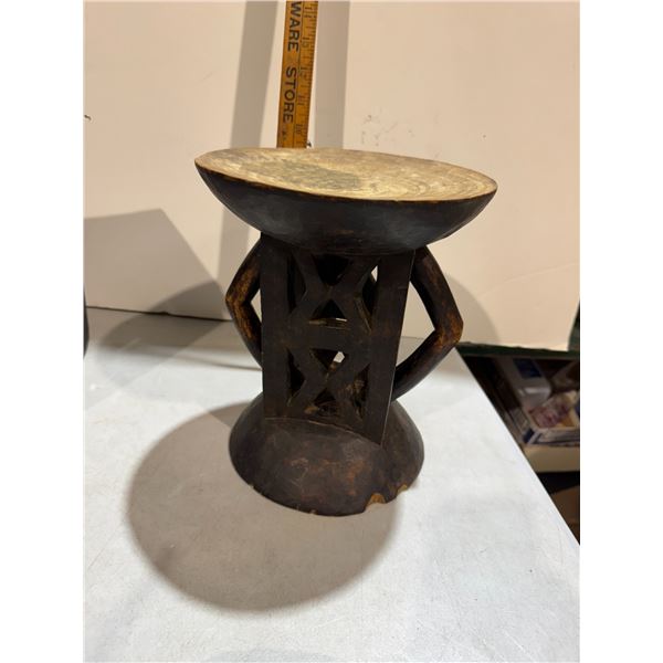 Carved stand