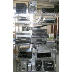 RACK LOT OF MISC. DVD PLAYERS & SPEAKERS