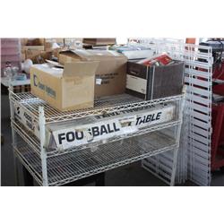 Rack of miscellaneous items, foosball table