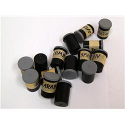 Film Cannisters Filled with Coins from Old Collect