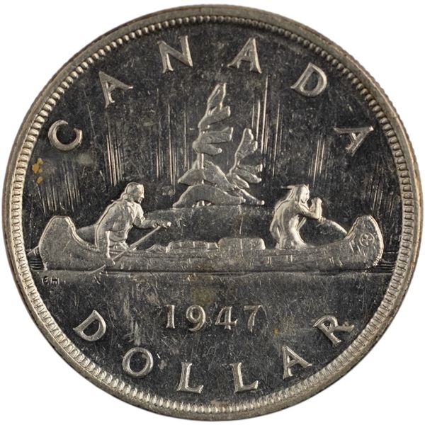 Canada 1947 Pointed 7 Silver Dollar