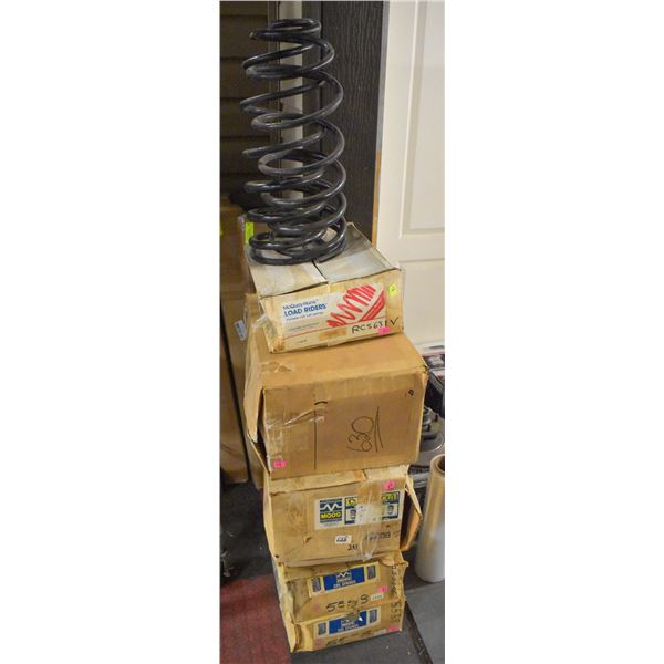 STACK OF ASSORTED COIL SPRINGS