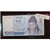 Image 1 : 530. Bank of Korea 1,000 Won. AU. Complete with security thread.