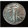 1003. 1942P Walking Liberty Half Dollar. AU.