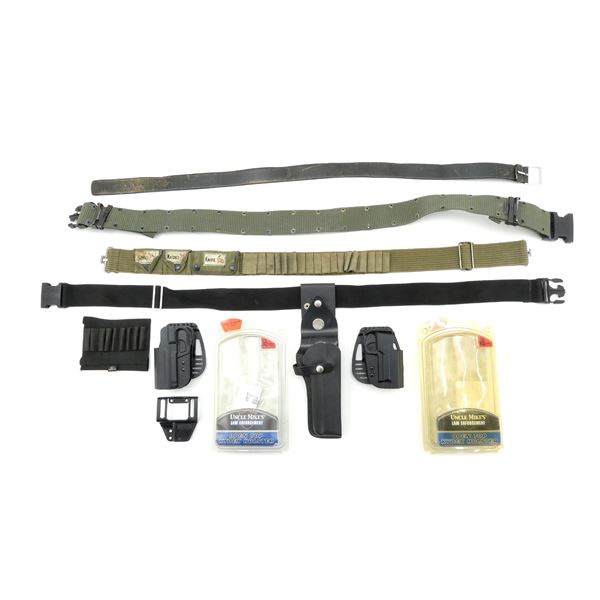 ASSORTED HOLSTERS AND AMMO BELTS LOT