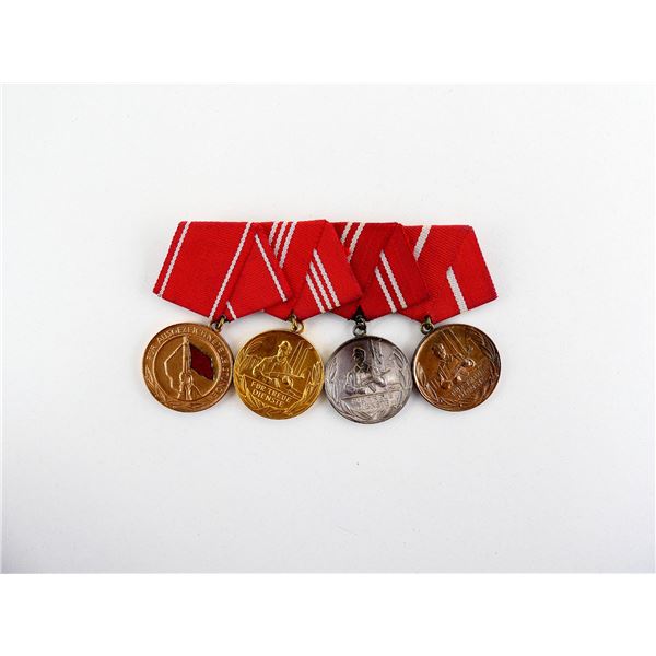 ASSORTED EAST GERMAN MILITARY MEDALS LOT