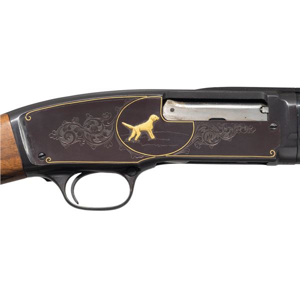 CUSTOM ENGRAVED WINCHESTER MODEL 42 PUMP SHOTGUN.