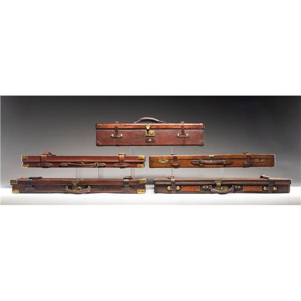 5 HARD TRUNK TYPE GUN CASES.