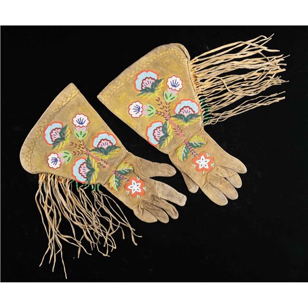 STRIKING PAIR OF NATIVE AMERICAN BEADED & FRINGED