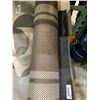 Image 1 : Brown and White Patterned Roll Rug