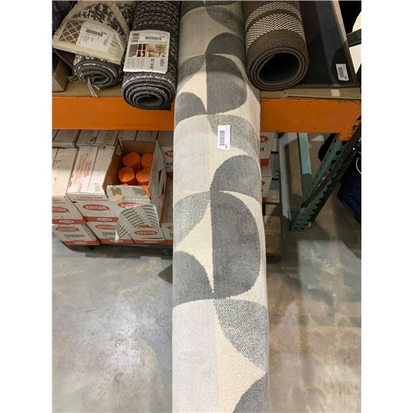 Area Rug With Abstract Gray and Beige Pattern