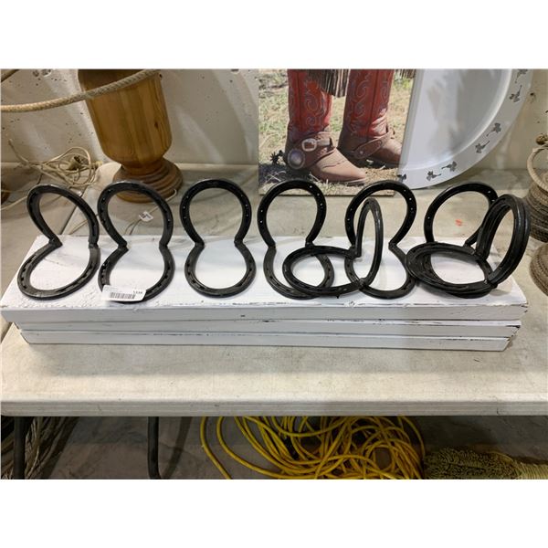 Metal Horseshoe Decorative Rack With White Wooden Base