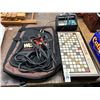 Image 1 : Battery Charger/Jumper Cables, Guitar Case, Scrabble Game