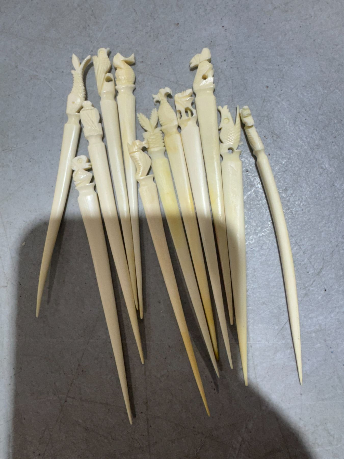 hand-carved bone or ivory toothpicks