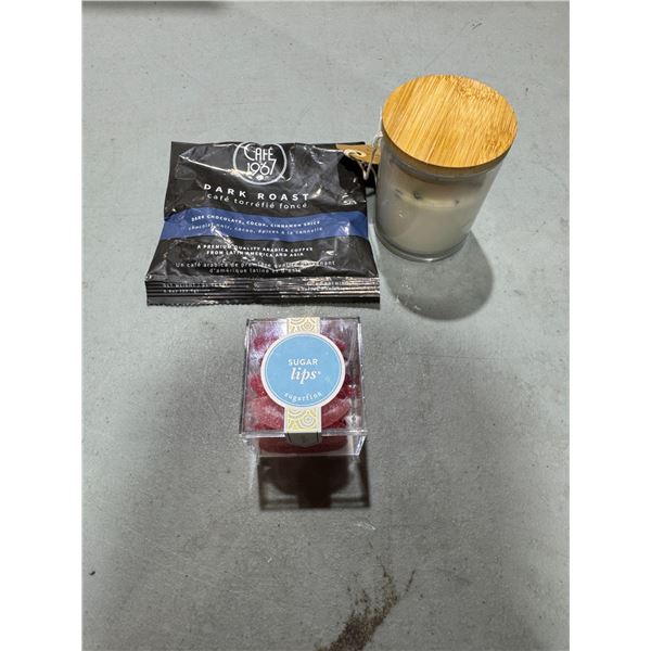 Sugar lips, new candle, and dark roast coffee