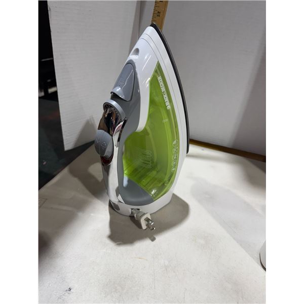 Iron with retractable cord