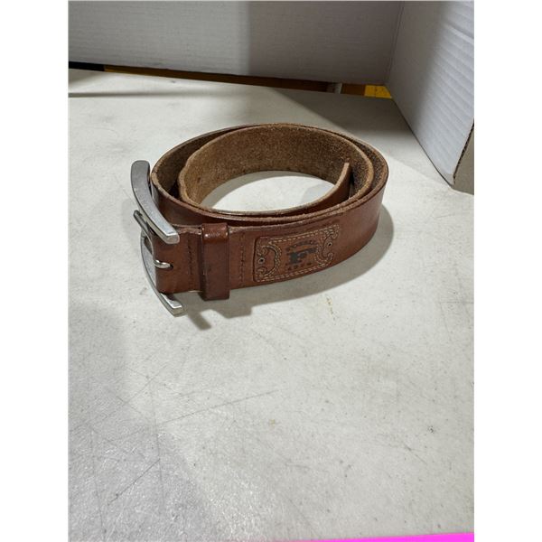 Fossil belt show shows some wear